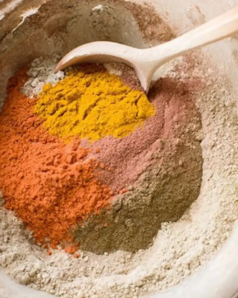 Colourful plants and herbs in powder form for dye process